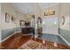 Inviting foyer with hardwood floors, decorative lighting, and classic decor, making a great first impression at 2637 S Nc 87, Graham, NC 27253