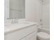 Bathroom with modern vanity, sink, mirror, and a shower-tub combination at 30 Chloe Ct, Selma, NC 27576