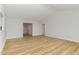 Spacious living area featuring sleek wood flooring and a flexible layout for furniture arrangement at 30 Chloe Ct, Selma, NC 27576