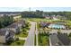 Aerial view of a residential neighborhood with a community pool and clubhouse at 3032 Curling Creek Drive Dr, Apex, NC 27502