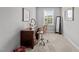 Bedroom showing a sewing machine station in front of the bright window, a cozy and creative nook at 3032 Curling Creek Drive Dr, Apex, NC 27502