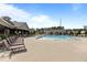 Community pool area features lounge chairs, clubhouse, and a splash pad at 3032 Curling Creek Drive Dr, Apex, NC 27502