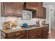 Gourmet kitchen featuring granite counters, subway tile backsplash, and stainless steel appliances at 3032 Curling Creek Drive Dr, Apex, NC 27502