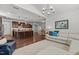 Open-concept living area with kitchen island, and an airy, spacious design at 3032 Curling Creek Drive Dr, Apex, NC 27502