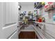 Walk-in pantry with metal shelving for ample storage space at 3032 Curling Creek Drive Dr, Apex, NC 27502
