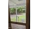 View through a screen door overlooking a yard at 306 Penny St, Garner, NC 27529