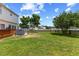 Backyard featuring a spacious lawn and wooden deck at 3101 Riverbrooke Dr, Raleigh, NC 27610