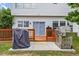 A lovely backyard patio area featuring a wood deck and grilling station at 3101 Riverbrooke Dr, Raleigh, NC 27610