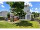 A spacious backyard featuring a fenced area, mature trees, and a utility shed at 3101 Riverbrooke Dr, Raleigh, NC 27610