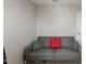 Neutral bedroom with a gray futon, ready for personalization at 3101 Riverbrooke Dr, Raleigh, NC 27610