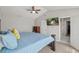 Bedroom featuring a vaulted ceiling and view into a bathroom at 3101 Riverbrooke Dr, Raleigh, NC 27610