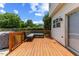 A beautiful wood deck featuring a grill and cozy outdoor seating area at 3101 Riverbrooke Dr, Raleigh, NC 27610