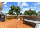 This is a deck with outdoor seating, an uncovered grill, and a covered grill at 3101 Riverbrooke Dr, Raleigh, NC 27610