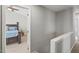 Comfortable main bedroom featuring neutral paint, carpet, and a doorway to an attached bathroom at 3101 Riverbrooke Dr, Raleigh, NC 27610