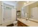 Practical bathroom with a shower-tub and oak vanity, designed for ease of use and comfort at 320 Madres Ln, Morrisville, NC 27560