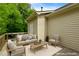 A cozy deck with outdoor furniture, perfect for relaxation and entertaining at 320 Madres Ln, Morrisville, NC 27560