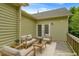 Charming outdoor deck furnished with comfortable seating, perfect for relaxing and entertaining in a private setting at 320 Madres Ln, Morrisville, NC 27560