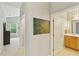 Hallway view leading to a bedroom and bathroom, showcasing the home's functional layout and design at 320 Madres Ln, Morrisville, NC 27560