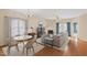 Inviting living room with hardwood floors, fireplace, and ample seating for entertaining at 320 Madres Ln, Morrisville, NC 27560