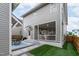 Backyard featuring a wood deck with outdoor seating, a covered porch and artificial turf at 3310 Mission Olive Pl, New Hill, NC 27562