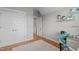 Light bedroom with a closet, desk, and a view to the hallway at 3310 Mission Olive Pl, New Hill, NC 27562