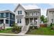 Inviting two-story home with a charming porch, steps, and well-maintained lawn and landscaping at 3310 Mission Olive Pl, New Hill, NC 27562