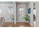 Inviting foyer with hardwood floors, natural light, and stylish decor at 3310 Mission Olive Pl, New Hill, NC 27562
