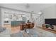 An open floor plan showcases the kitchen, dining room, and living room, creating a seamless flow for entertaining at 3310 Mission Olive Pl, New Hill, NC 27562