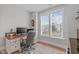 Inviting home office features hardwood floors, a large window, and neutral walls at 3310 Mission Olive Pl, New Hill, NC 27562
