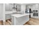 Spacious kitchen featuring a center island, stainless steel appliances, and sleek countertops at 333 Natsam Woods Way, Wake Forest, NC 27587