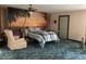 Bedroom featuring a unique mural and comfortable furnishings at 3555 Nc 98 Hwy, Youngsville, NC 27596