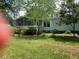 Charming single-story home with a well-maintained front yard and mature trees at 3555 Nc 98 Hwy, Youngsville, NC 27596
