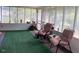 Inviting screened porch with comfortable seating, perfect for relaxing outdoors at 3555 Nc 98 Hwy, Youngsville, NC 27596