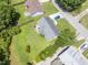 Aerial view of a well-maintained home featuring a large, green backyard with privacy trees at 3624 Meadow Creek Ln, Raleigh, NC 27616