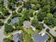 Aerial view showcases the property nestled within a neighborhood at 3811 Cottonwood Dr, Durham, NC 27705