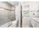 Bathroom with shower and open view to a bedroom at 3811 Cottonwood Dr, Durham, NC 27705