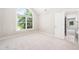 Bedroom with large window and view to the outside at 3811 Cottonwood Dr, Durham, NC 27705