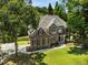 Beautiful two story brick home with manicured lawn at 3811 Cottonwood Dr, Durham, NC 27705