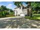 View of the side exterior of the home, with a garage and driveway at 3811 Cottonwood Dr, Durham, NC 27705