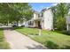 Charming two-story home with a well-manicured lawn, front-facing garage and a cozy front porch at 401 Holly Thorn Trce, Holly Springs, NC 27540
