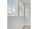 Window view into neighborhood from a bright walk-in closet with white trim and carpet at 413 Westfalen Dr, Cary, NC 27519