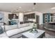 Spacious living room and kitchen showcasing an open layout and modern finishes at 414 Grange Farm Pl, Raleigh, NC 27603