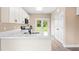 Stylish kitchen with modern appliances and convenient island at 414 S Center St, Princeton, NC 27569