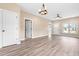 Large open-concept floor plan with dining and entry way at 414 S Center St, Princeton, NC 27569
