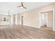 Spacious living area with ceiling fan and neutral wall colors at 414 S Center St, Princeton, NC 27569