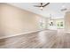Open concept living room featuring hardwood floors and lots of natural light at 414 S Center St, Princeton, NC 27569