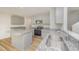 This kitchen offers stainless appliances, granite countertops and a useful island at 44 Chloe Ct, Selma, NC 27576