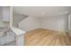 Open living area with seamless flooring and an open view from the kitchen island at 44 Chloe Ct, Selma, NC 27576
