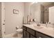 A well-lit bathroom includes a vanity and an enclosed toilet area at 440 Bramble Ln, Clayton, NC 27527