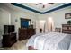 A large main bedroom features a ceiling fan and en-suite bathroom at 440 Bramble Ln, Clayton, NC 27527